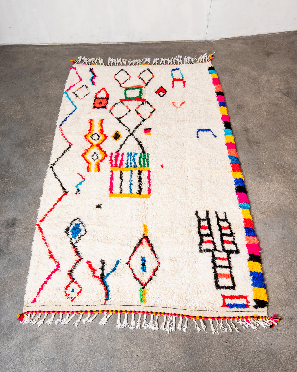 Modern designer handcrafted Berber rug from morocco Azilal with beautiful colors and patterns.